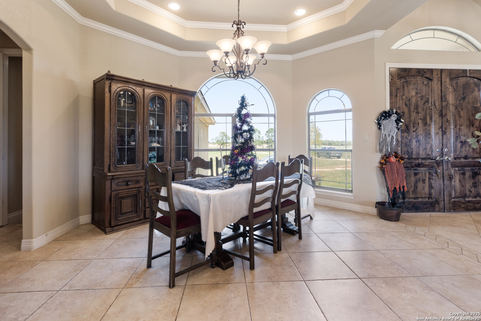 338 Tower Road San Antonio, TX 78223 - Photo 8 of 26 a view of a dining room with furniture and chandelier