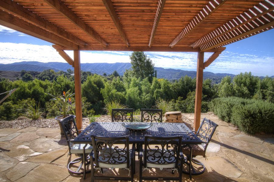 302 Fairview Road Ojai, CA 93023 - Photo 26 of 28 a view of a patio with a table chairs and a table