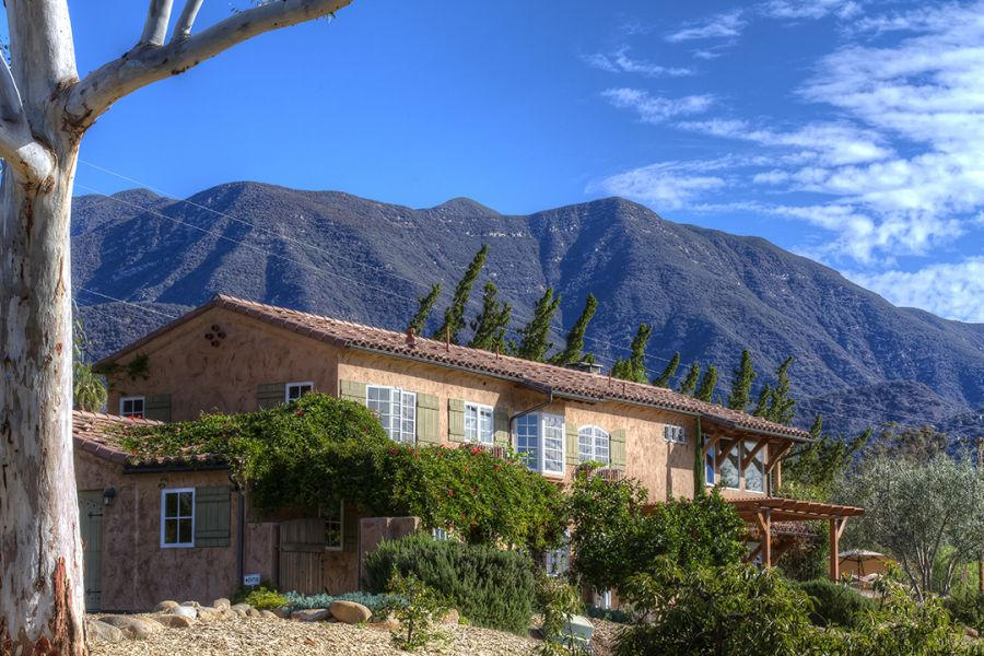 302 Fairview Road Ojai, CA 93023 - Photo 3 of 28 a view of a house with a yard and balcony