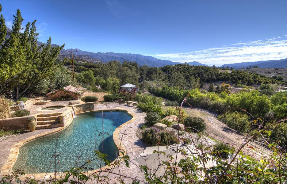 302 Fairview Road Ojai, CA 93023 - Photo 5 of 28 a view of a lake with couches in the patio