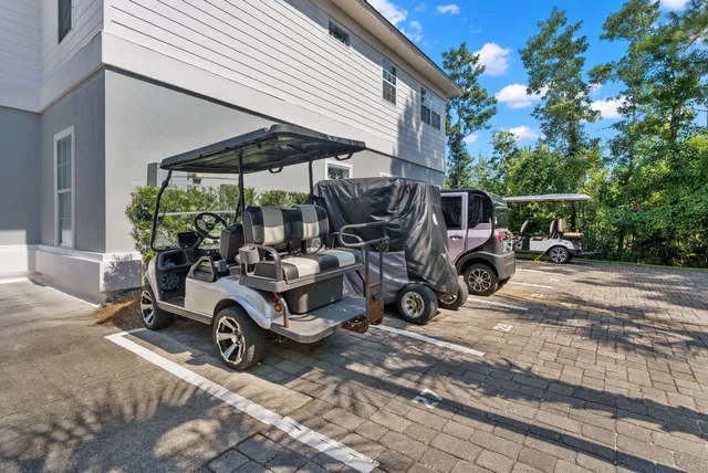 a view of car parked on the side of the road