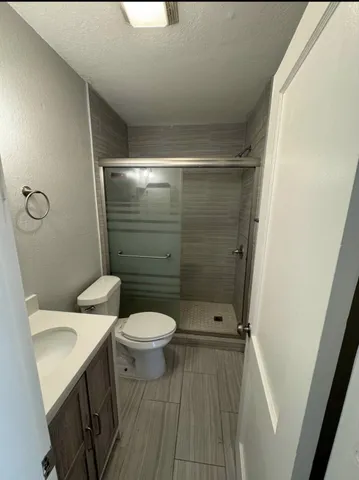 a bathroom with a sink and a toilet