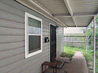 8416 La Porte Road Houston, TX 77012 - Photo 2 of 14 a backyard of a house with a fountain and outdoor seating