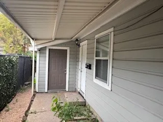 a front view of a house with a porch