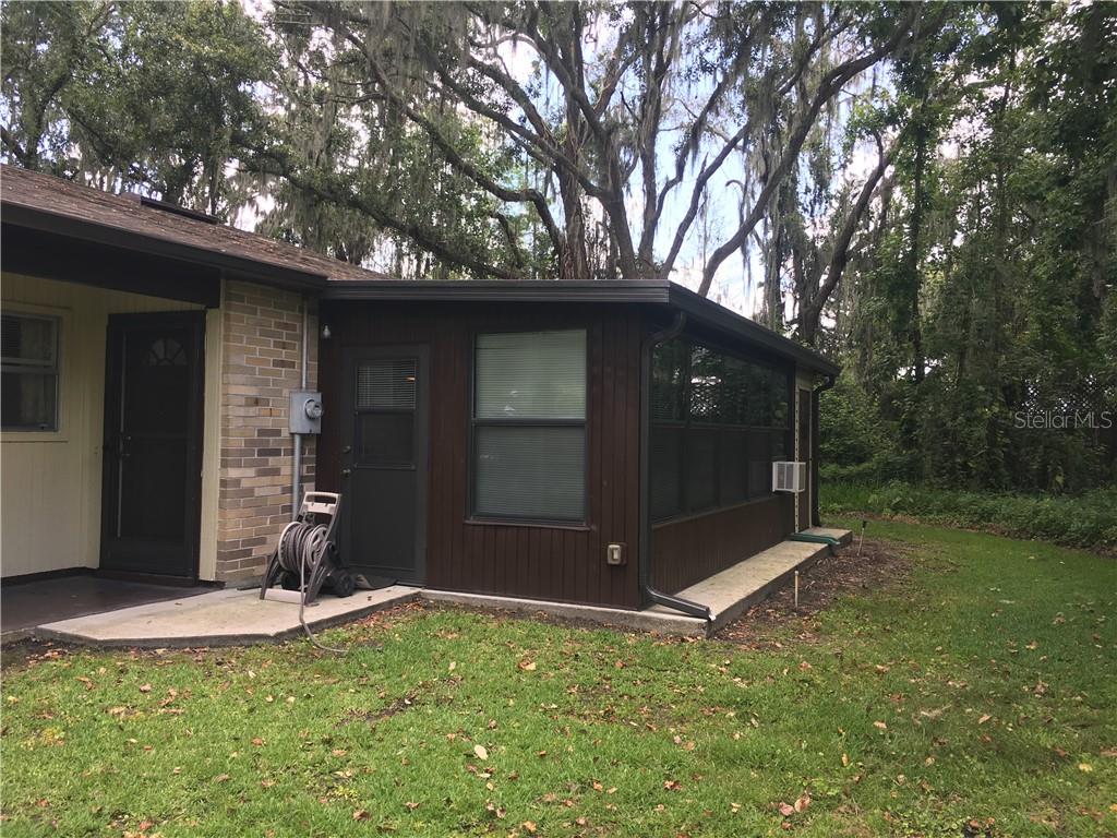 141 Fernery Road, Unit H9 Lakeland, FL 33809 - Photo 1 of 1 a front view of a house with a yard