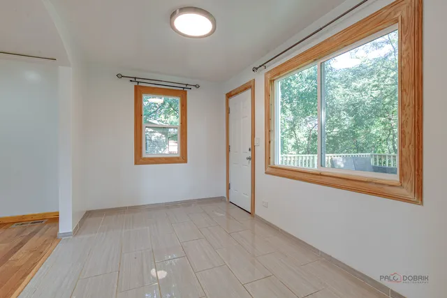 an empty room with windows