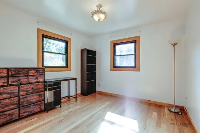 a view of a livingroom with furniture and a window