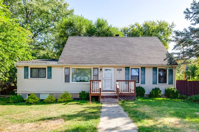 a view of house with a garden