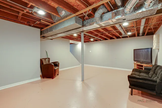 a view of room with wooden floor