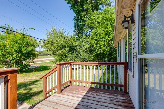 a view of a backyard with swimming pool