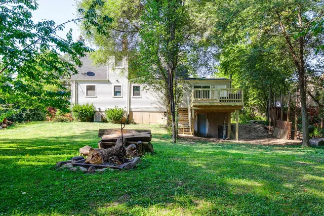 a view of a yard with a tree