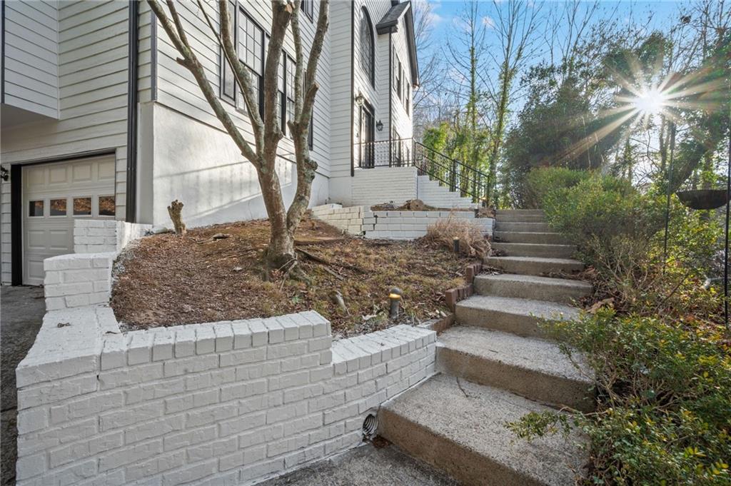 2250 Chickering Court Cumming, GA 30041 - Photo 2 of 25 a view of a house with a yard