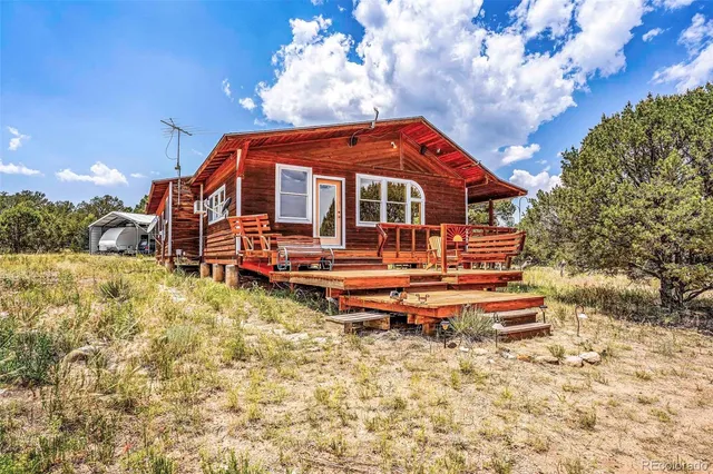 a front view of a house with swimming pool