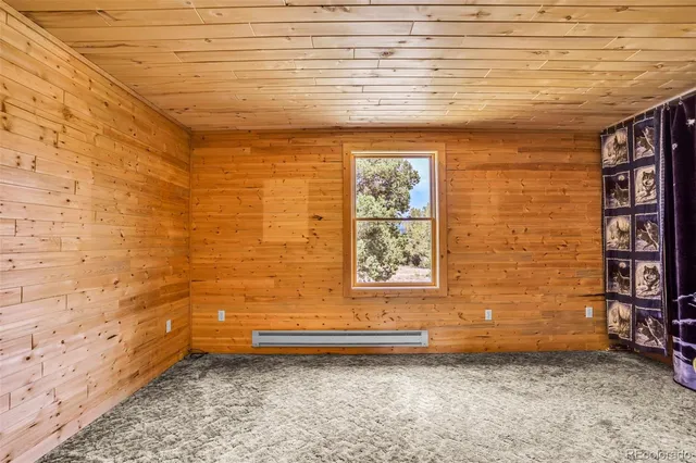 a view of a door and chair in the room