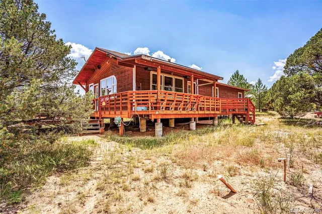 a view of sitting area in front of house