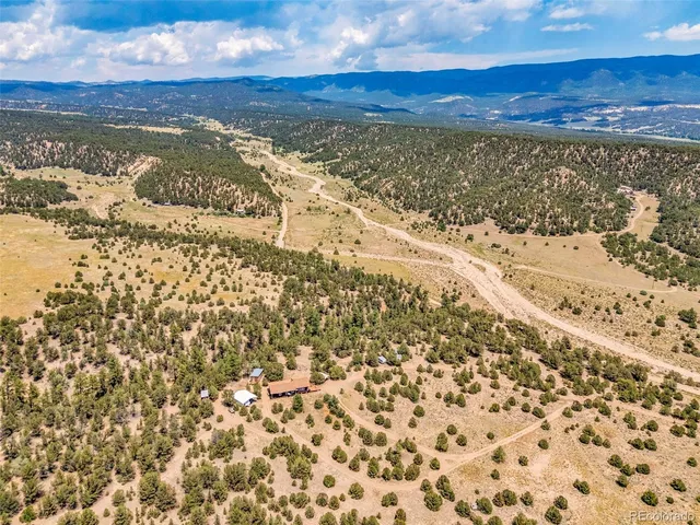 a view of an ocean and a mountain
