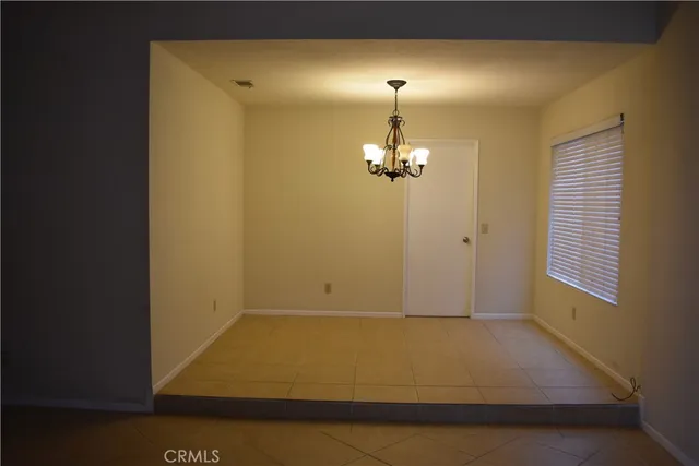 a view of empty room with a window