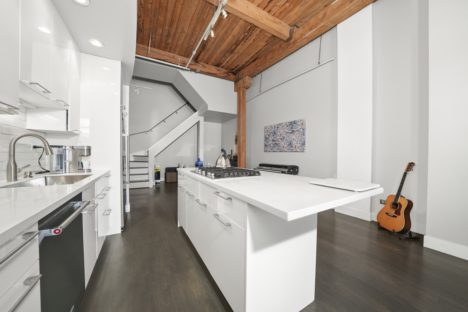 360 West Illinois Street, Unit 614 Chicago, IL 60654 - Photo 11 of 36 a kitchen that has a sink and a stove top oven