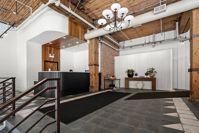 a view of a livingroom with furniture