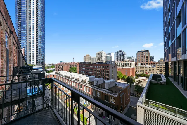 a view of a balcony with city view