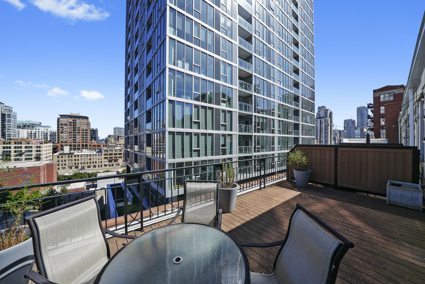 360 West Illinois Street, Unit 614 Chicago, IL 60654 - Photo 25 of 36 a view of a chairs and table in the terrace