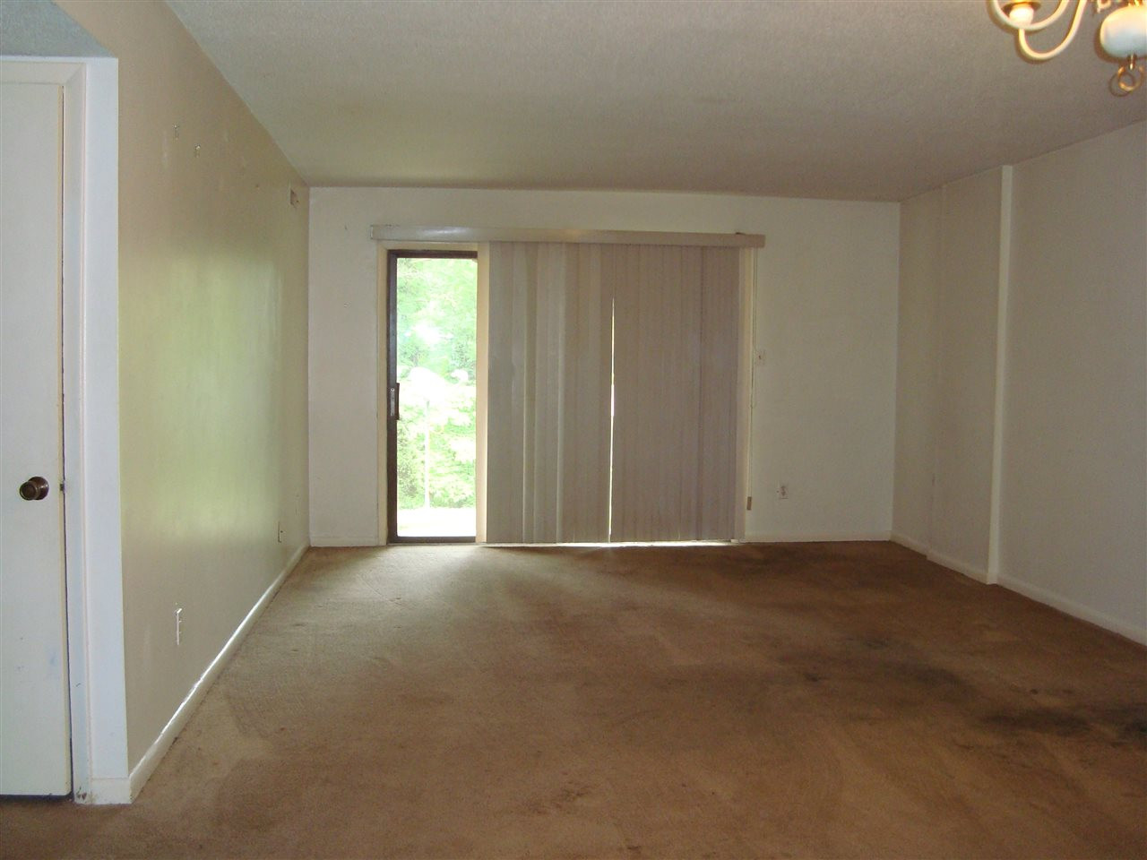 5104 Flint Ridge Place, Unit 5104 Raleigh, NC 27609 - Photo 12 of 12 Nice open floor plan,family room has patio outside overlooking the water! Family Room