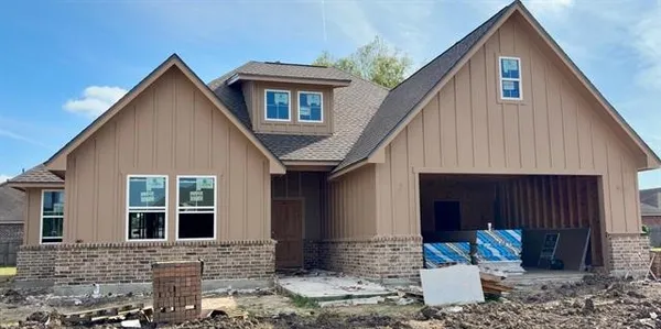 a front view of a house with patio
