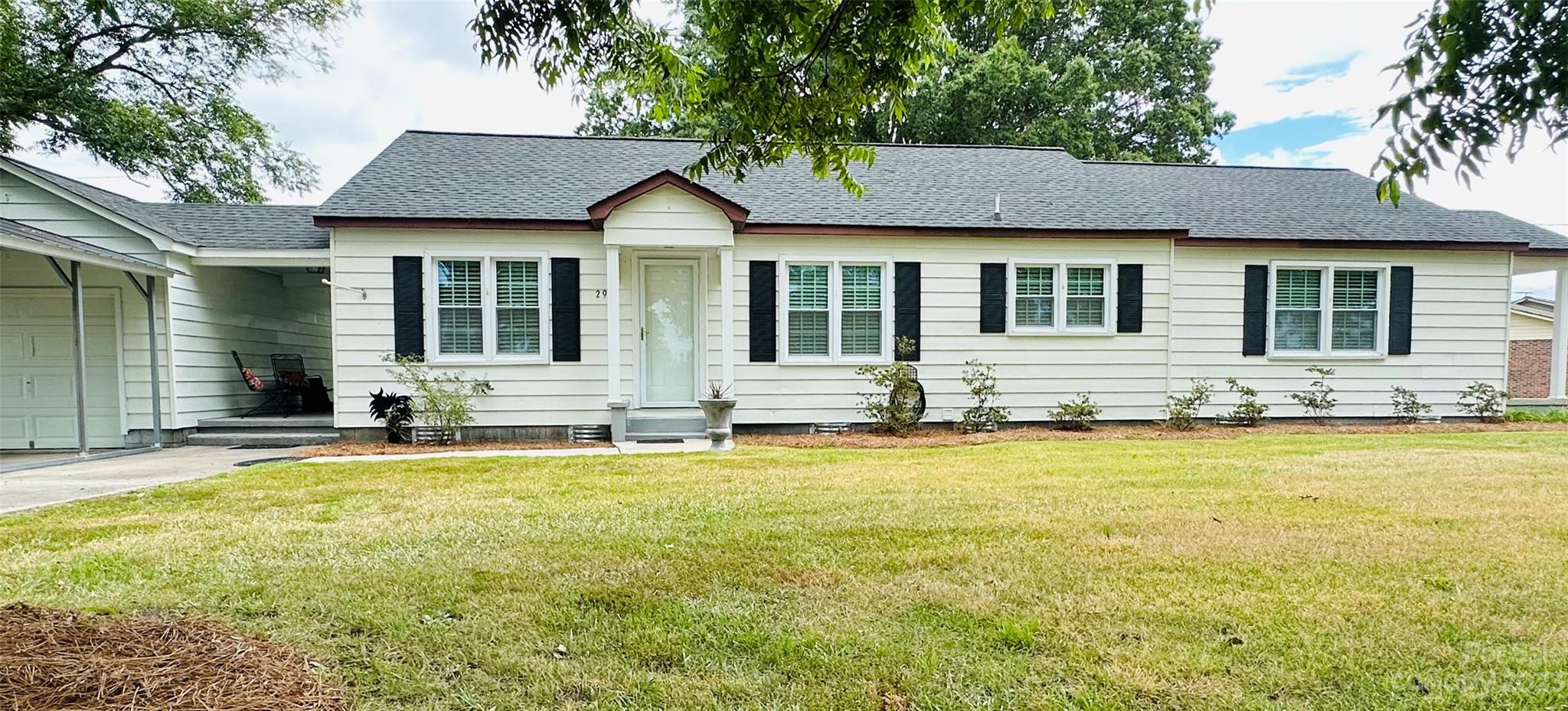 2979 North Rocky River Road Lancaster, SC 29720 - Photo 3 of 19 a front view of a house with swimming pool