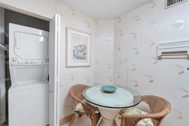 a bathroom with a toilet and a mirror