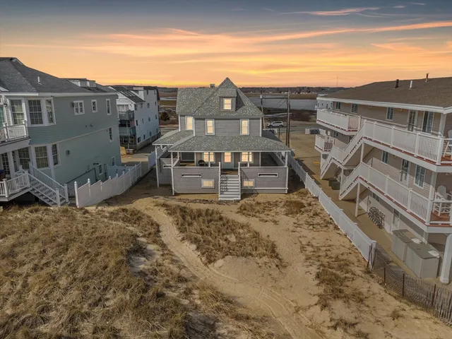 a view of a big house with a mountain view