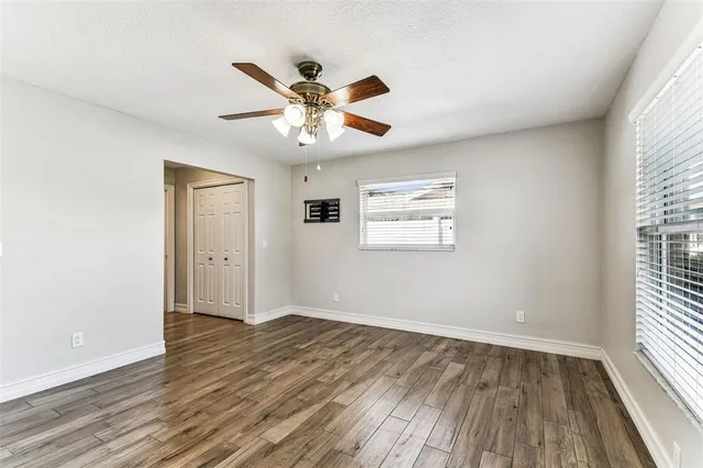 a view of swimming pool with a patio