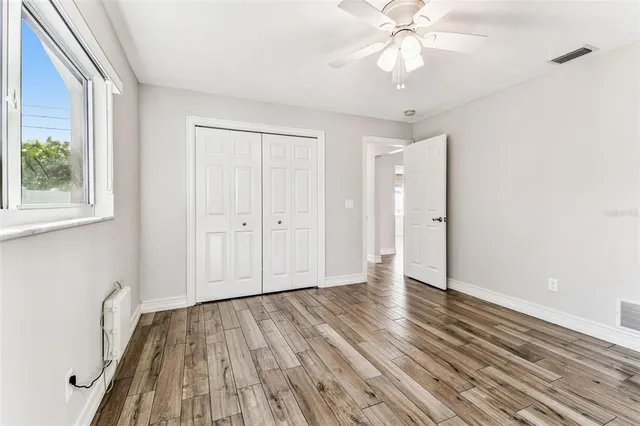 an aerial view of residential houses with city view
