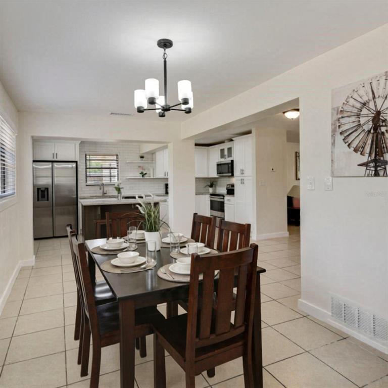 1202 Princeton Road Cocoa, FL 32922 - Photo 11 of 15 a view of a dining room with furniture