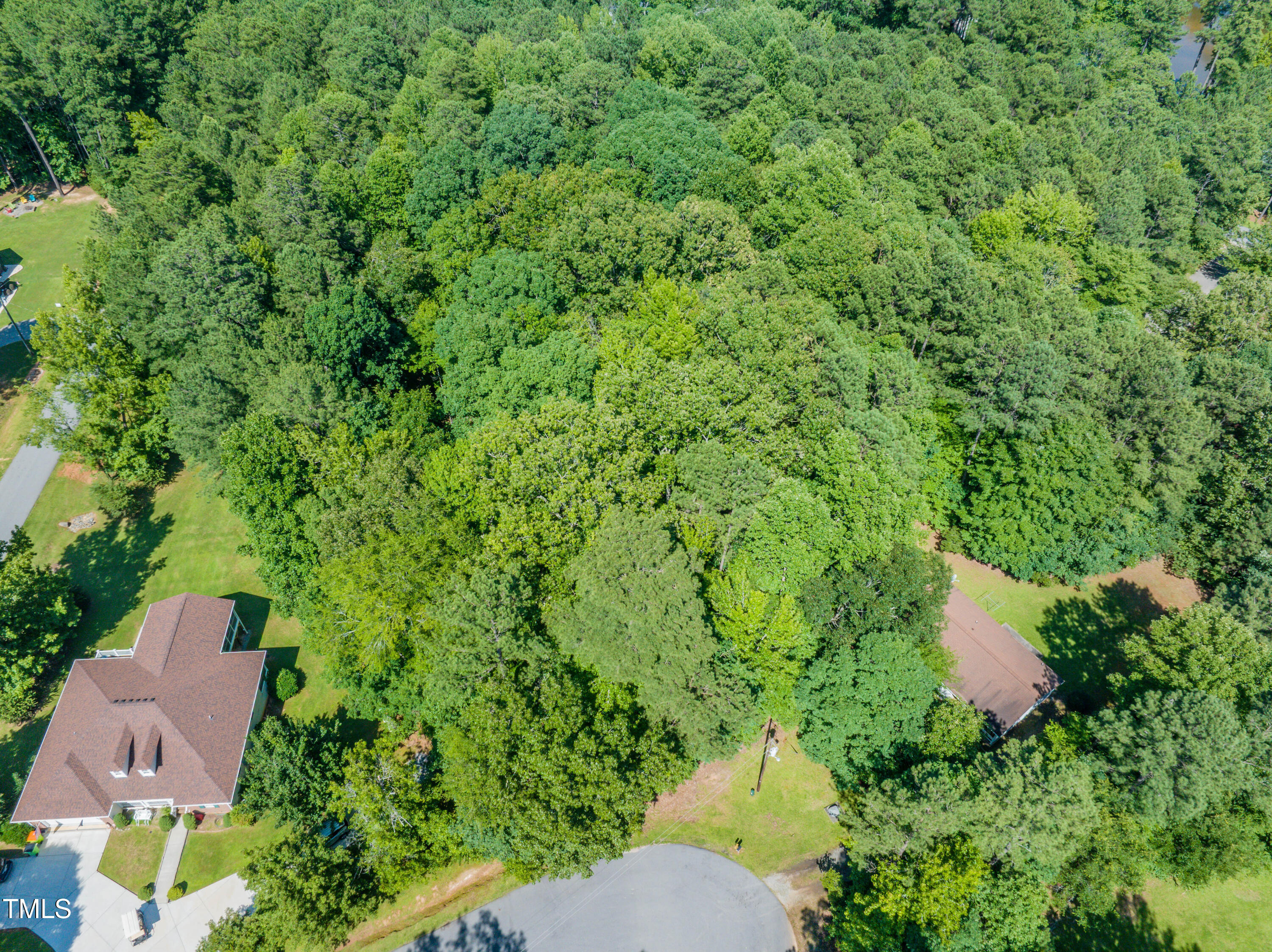 Lot 6 Rabbit Bottom Circle Littleton, NC 27850 - Photo 2 of 39 an aerial view of residential house with outdoor space and trees all around