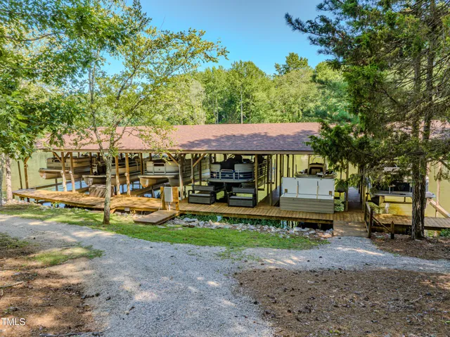 a view of a swimming pool with chairs