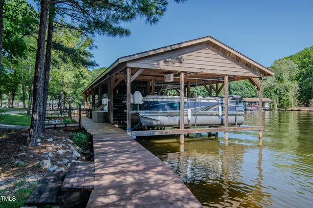 a street sign that is sitting on a rock