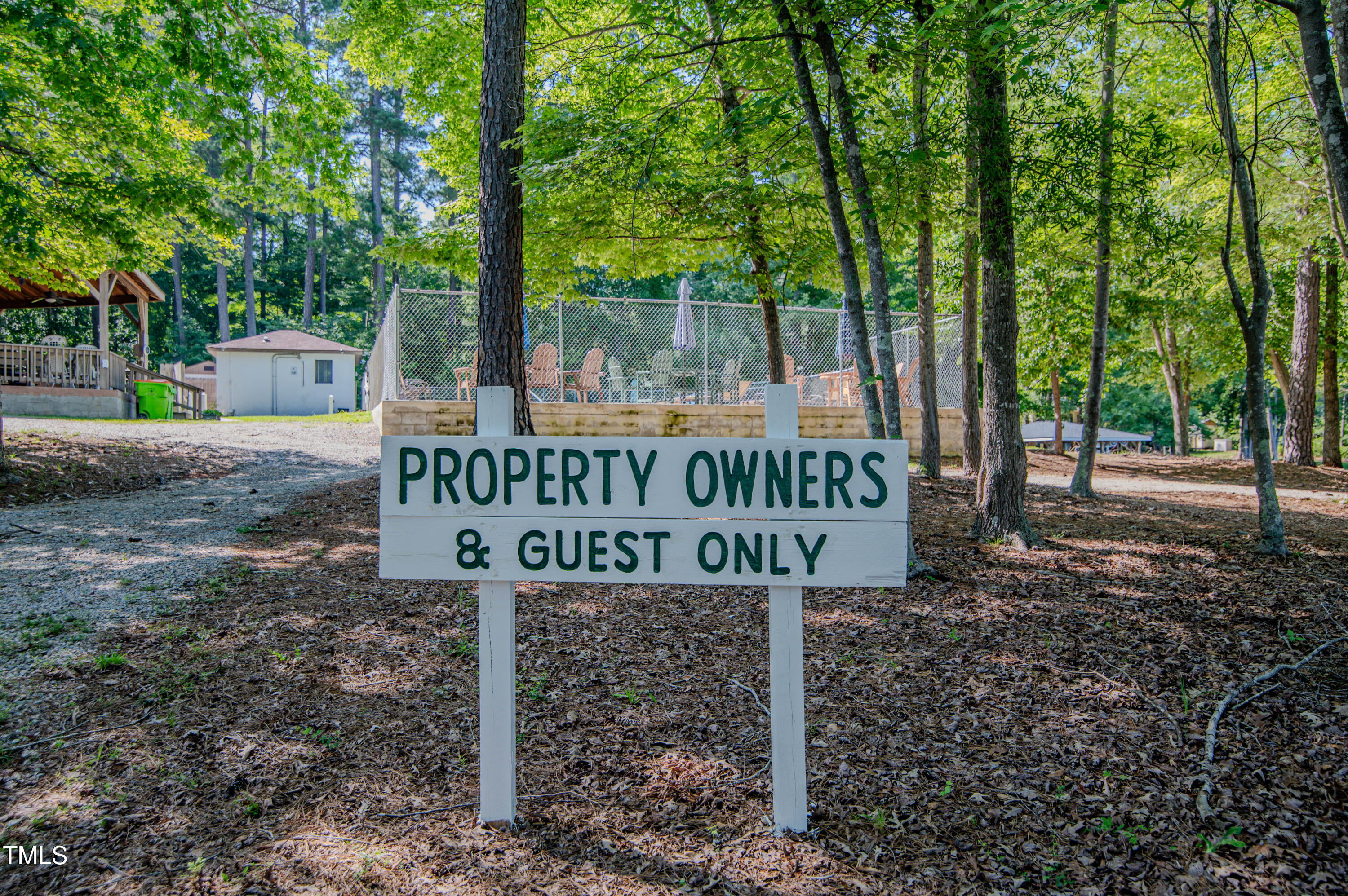 Lot 6 Rabbit Bottom Circle Littleton, NC 27850 - Photo 33 of 39 a street sign that is sitting on a rock