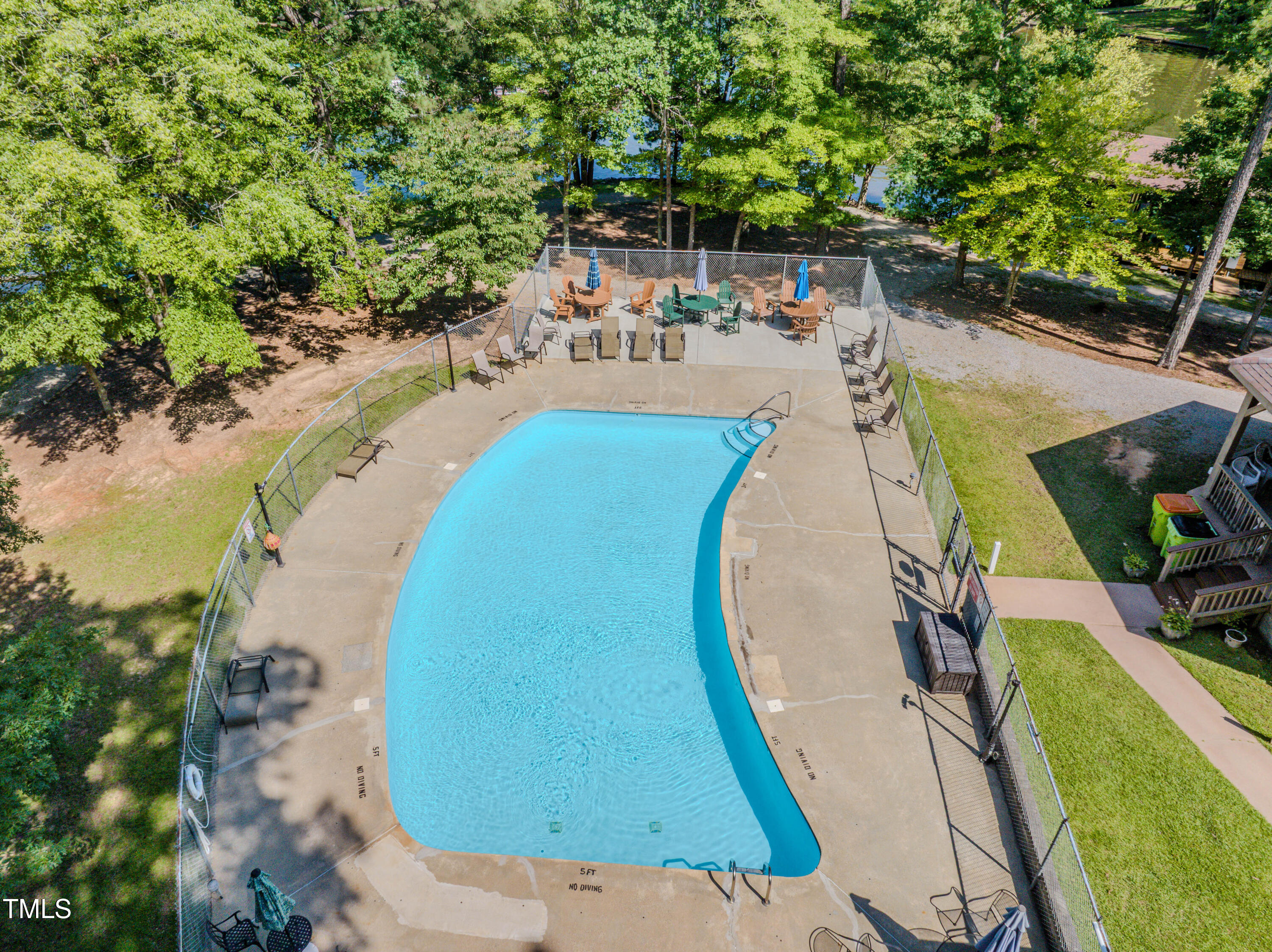 Lot 6 Rabbit Bottom Circle Littleton, NC 27850 - Photo 5 of 39 an aerial view of a swimming pool with a yard and seating area