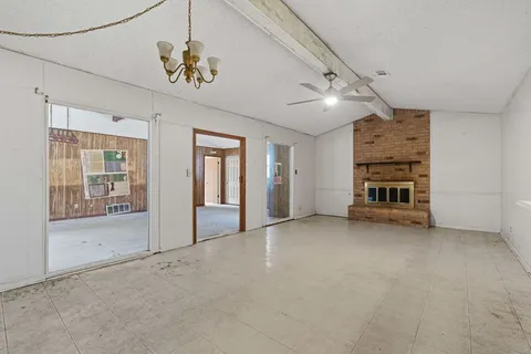 a view of a livingroom with a fireplace
