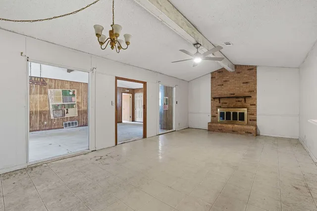 a view of a livingroom with a fireplace