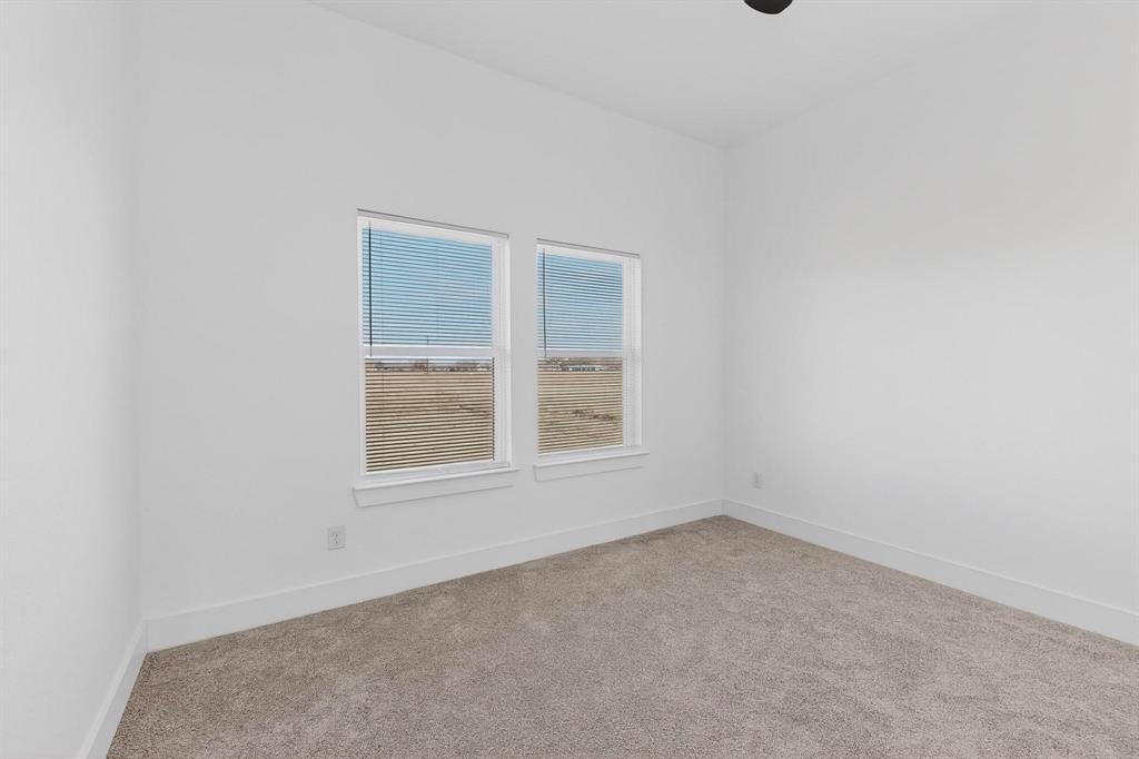 4464 Key Ranch Road Trinidad, TX 75163 - Photo 30 of 40 Empty room featuring light colored carpet and baseboards