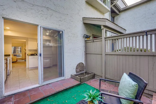 a kitchen with a sink and a refrigerator