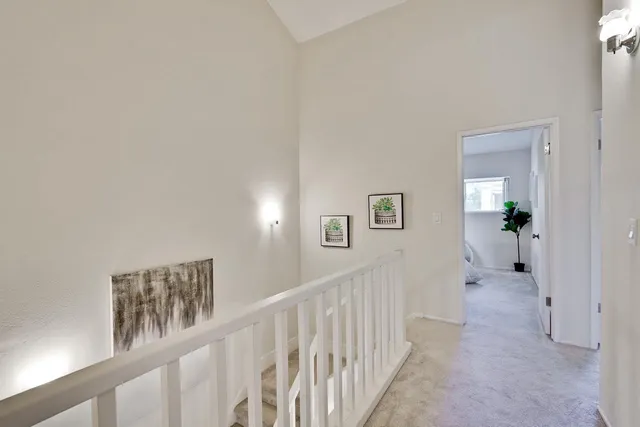 a front view of a house with a yard and a garage