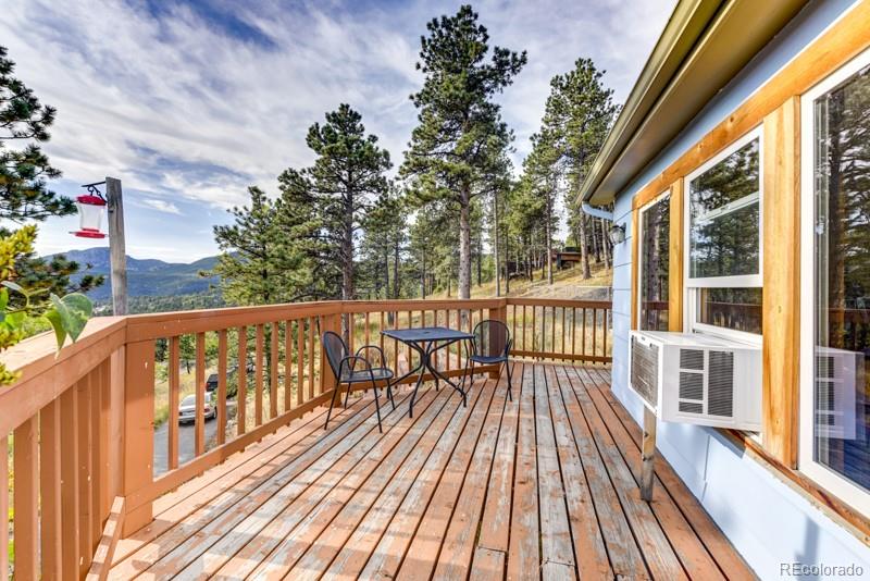 11773 Hillcrest Road Golden, CO 80403 - Photo 10 of 34 a view of balcony with wooden floor and fence