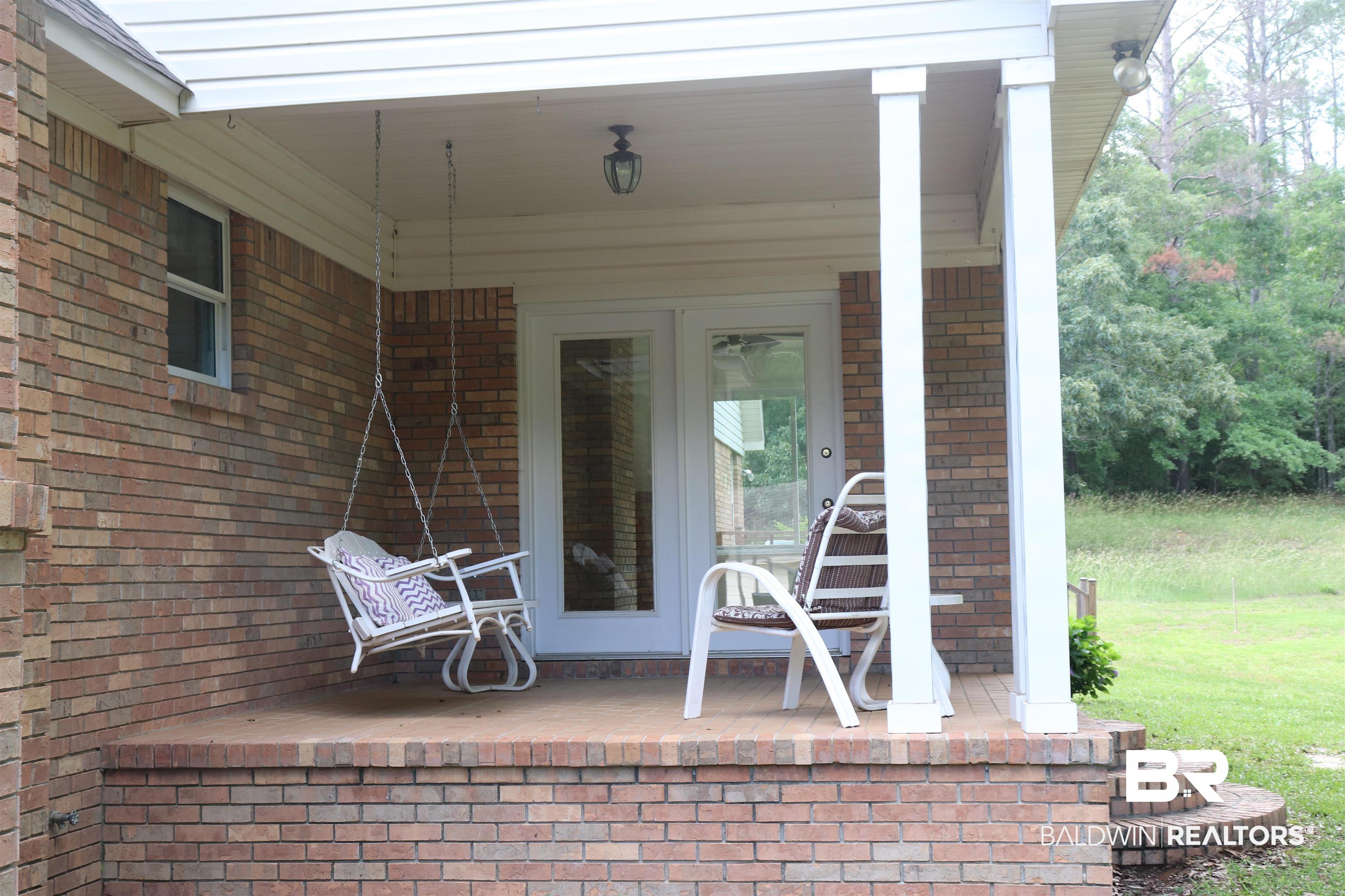 1823 Experiment Farm Road Monroeville, AL 36460 - Photo 38 of 46 back deck off sunroom