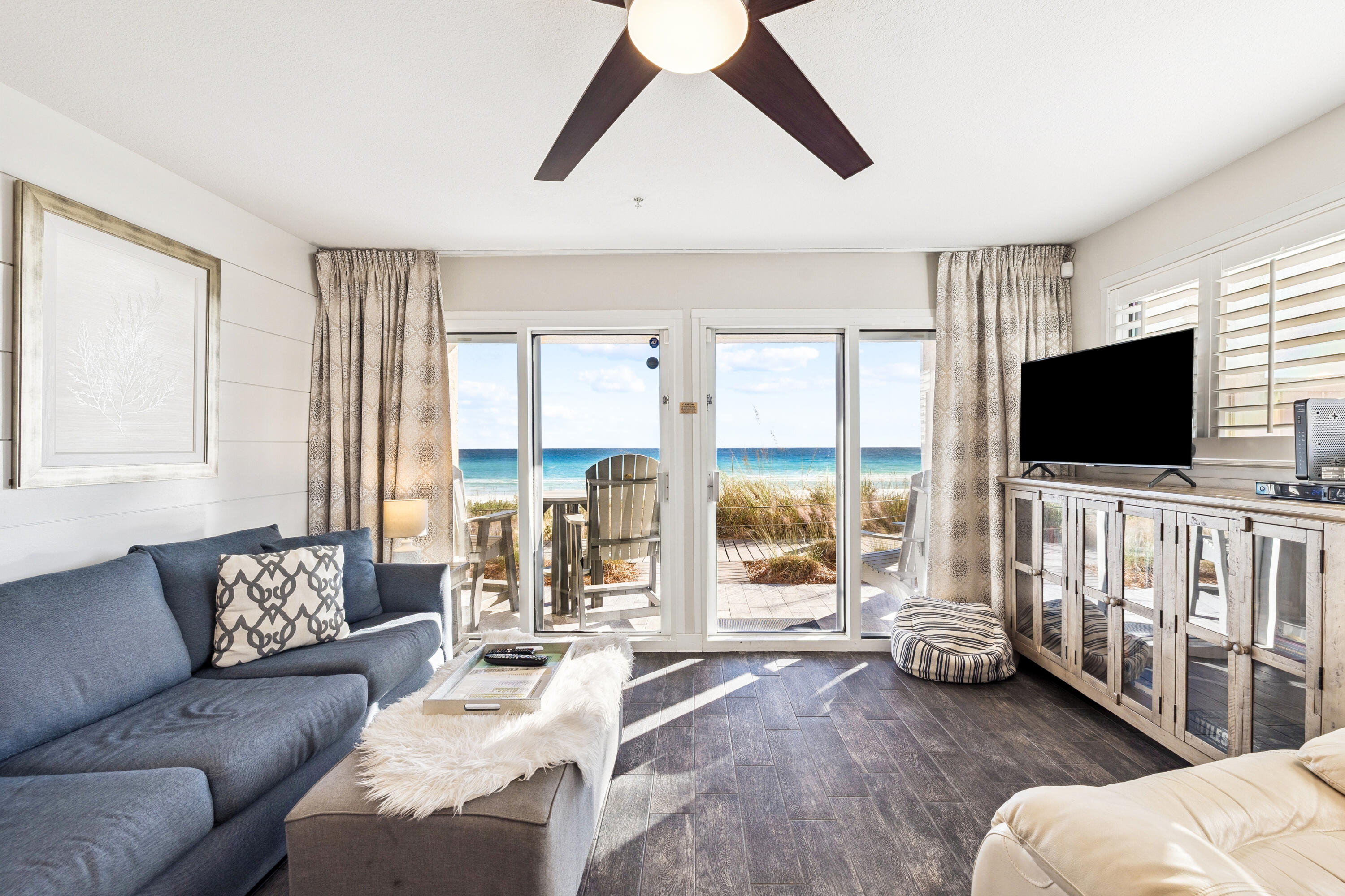 3184 East Scenic Highway 98, Unit 116A Destin, FL 32541 - Photo 4 of 29 a living room with furniture and a flat screen tv