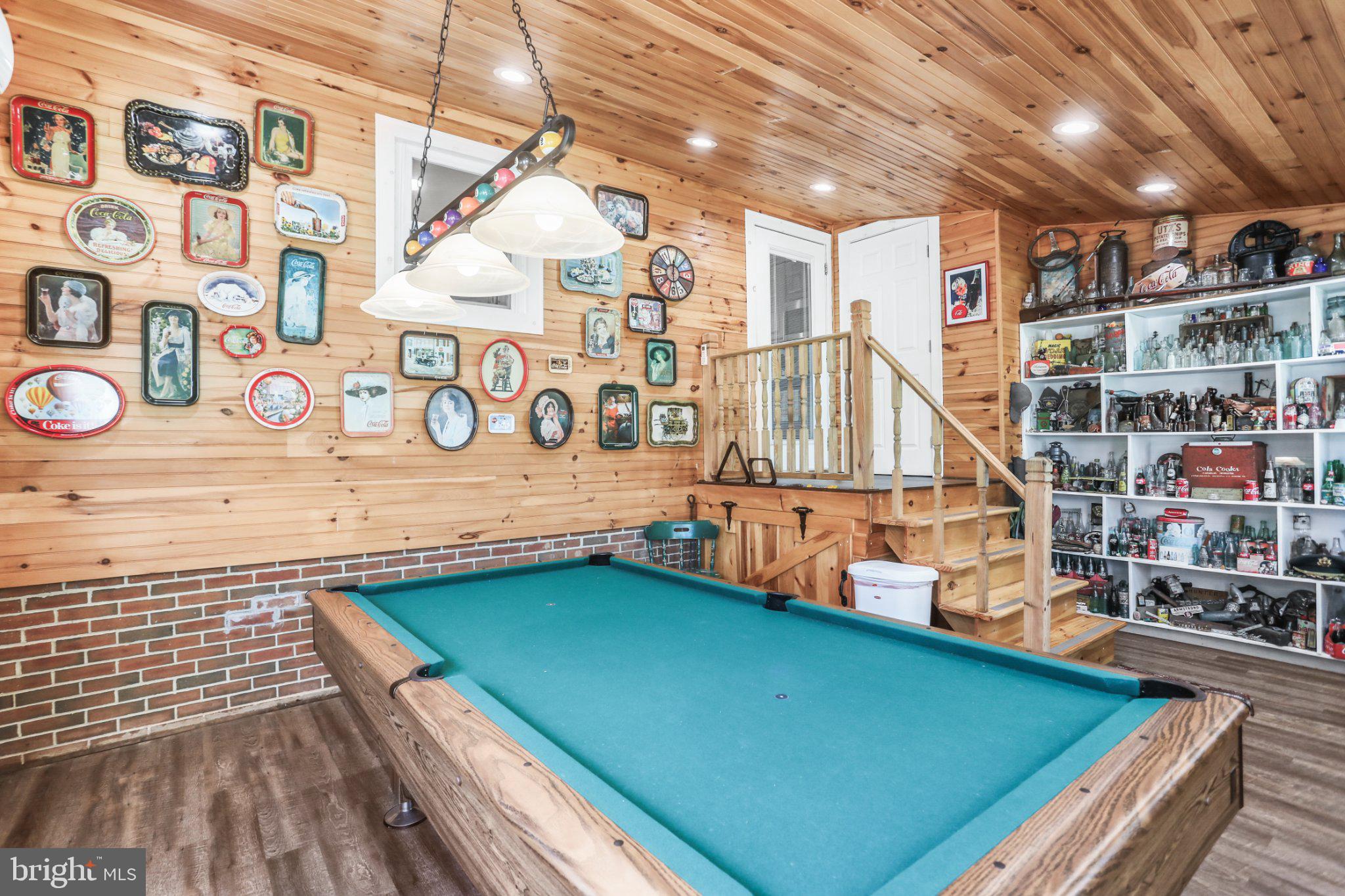 1734 Cemetery Road York, PA 17408 - Photo 29 of 52 Charming game room with rustic flair.