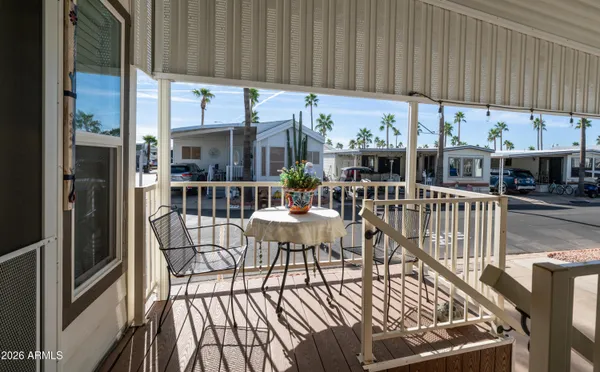 a view of a porch with furniture