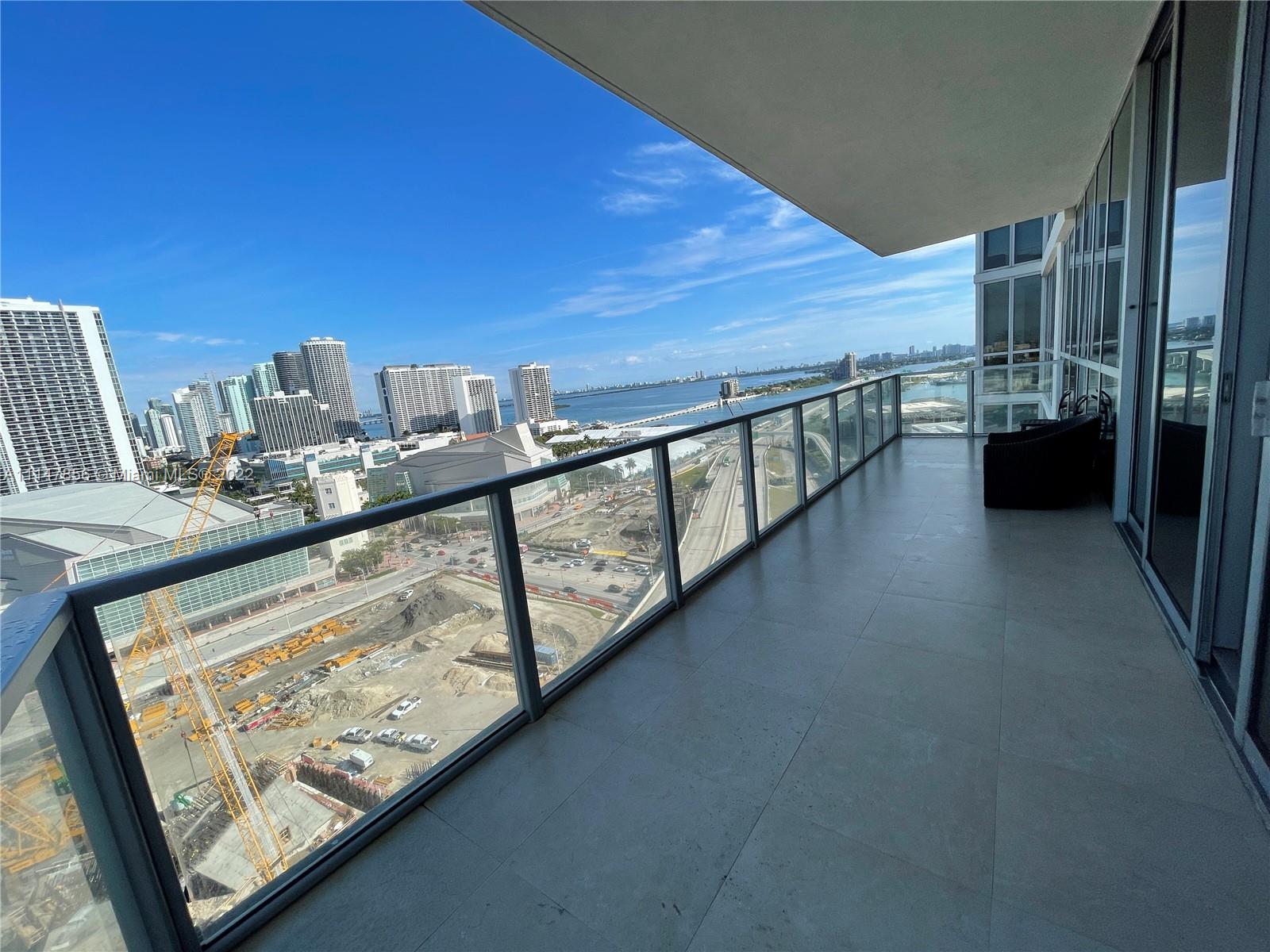 1100 Biscayne Boulevard, Unit 2003 Miami, FL 33132 - Photo 13 of 24 a view of a balcony with chairs