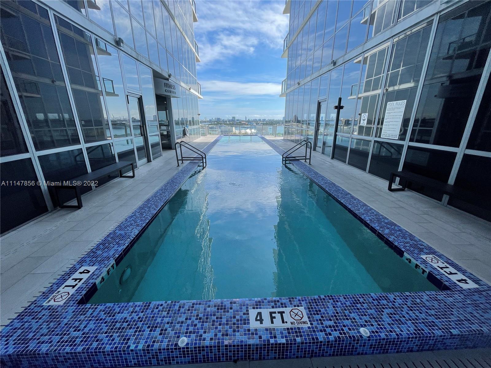 1100 Biscayne Boulevard, Unit 2003 Miami, FL 33132 - Photo 18 of 24 a view of a house with a backyard